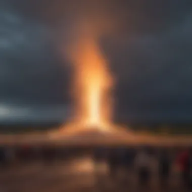 Visitors observing the eruption of Old Faithful Geyser