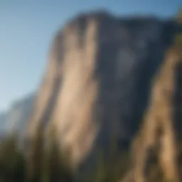 Majestic cliffs of Yosemite National Park under a clear blue sky.