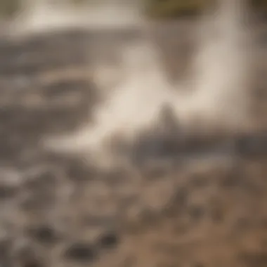 Bubbling Mud and Geothermal Activity Close-up of the bubbling mud and steam at a Yellowstone mud volcano, highlighting its geothermal activity