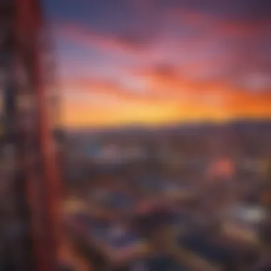 The Eye Ferris Wheel during a vibrant sunset, casting shadows across the Las Vegas Strip.